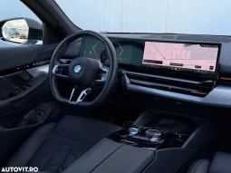 
										BMW Seria 5 520i AT MHEV full									