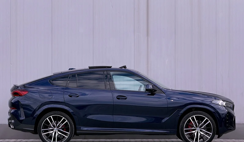 
								BMW X6 xDrive40d AT MHEV full									